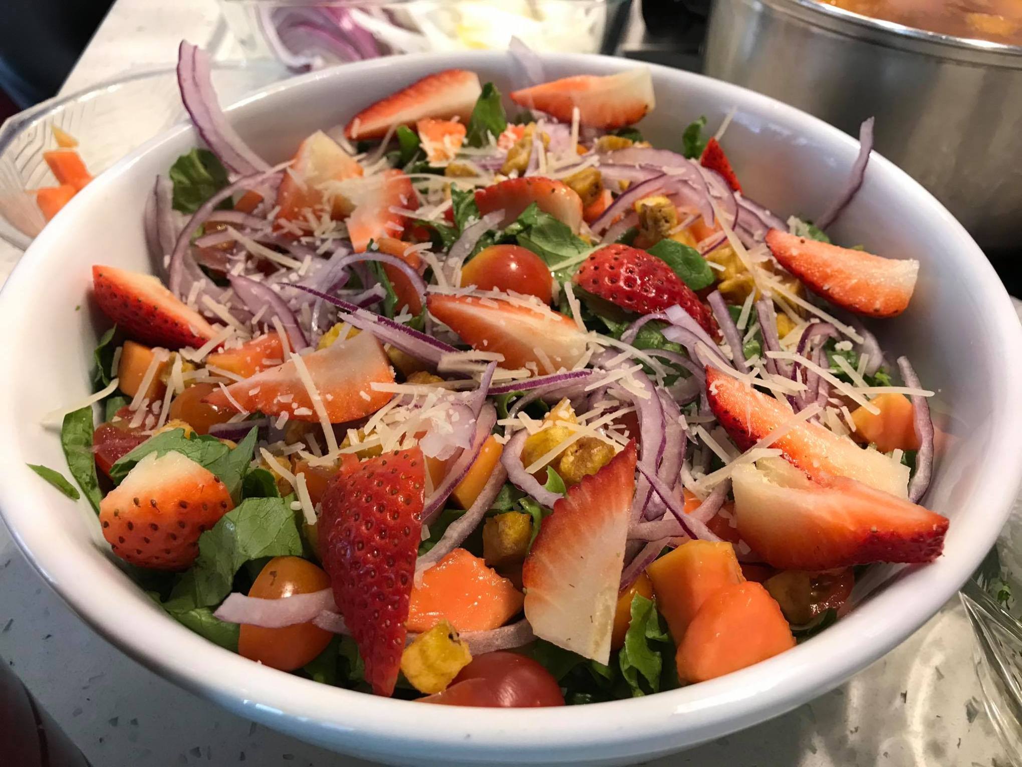 a bowl filled with meat and vegetables