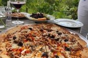 a pizza sitting on top of a table