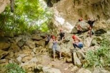 a person standing on a rock