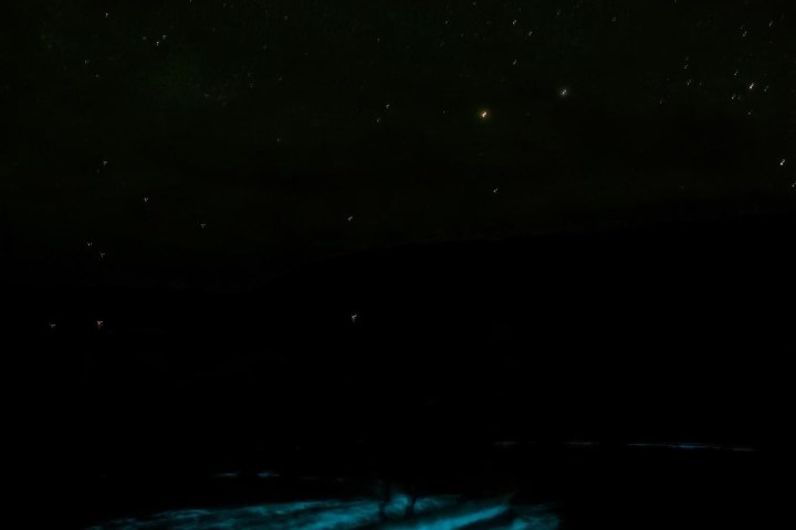 a person in a dark sky