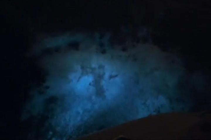 a blurry image in a dark sky